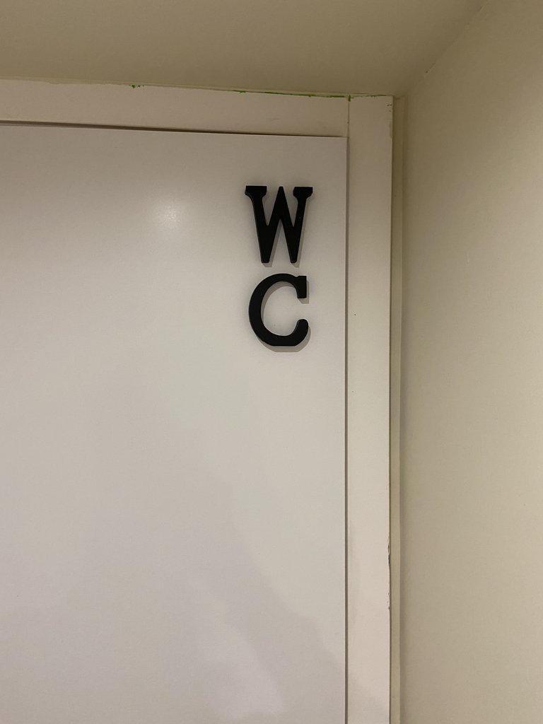 Señalización entrada WC