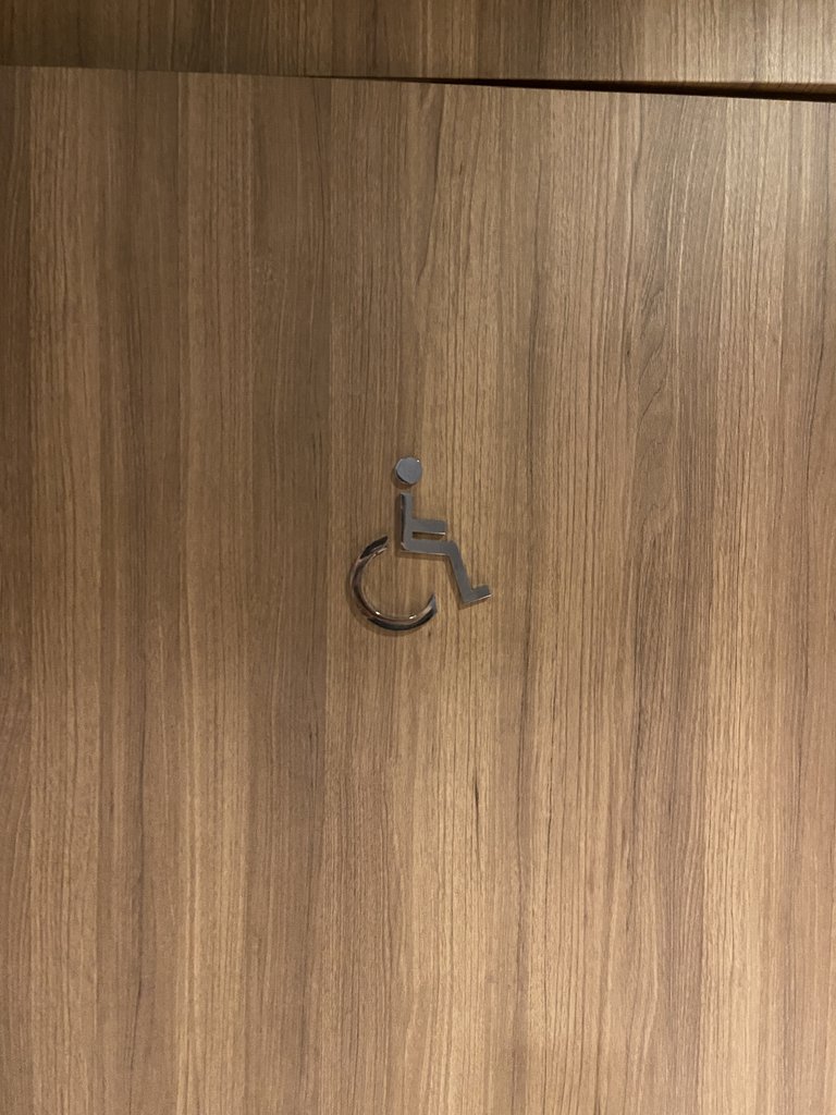 Señalización baños comunes adaptados.