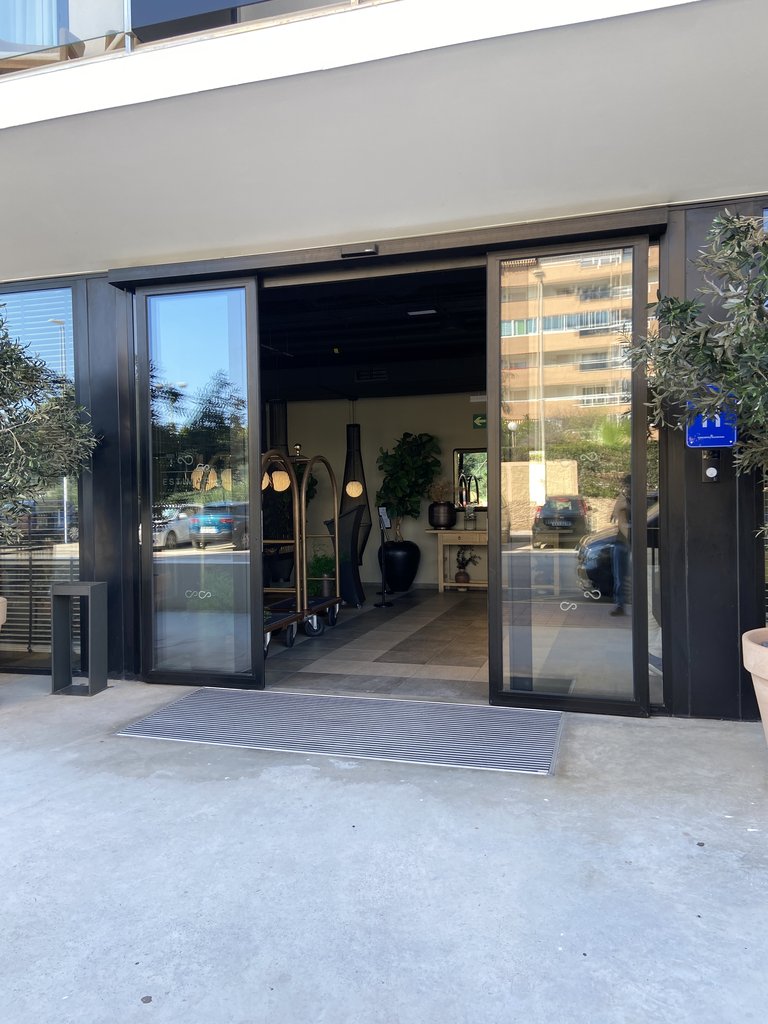 Automatic doors for establishment access.