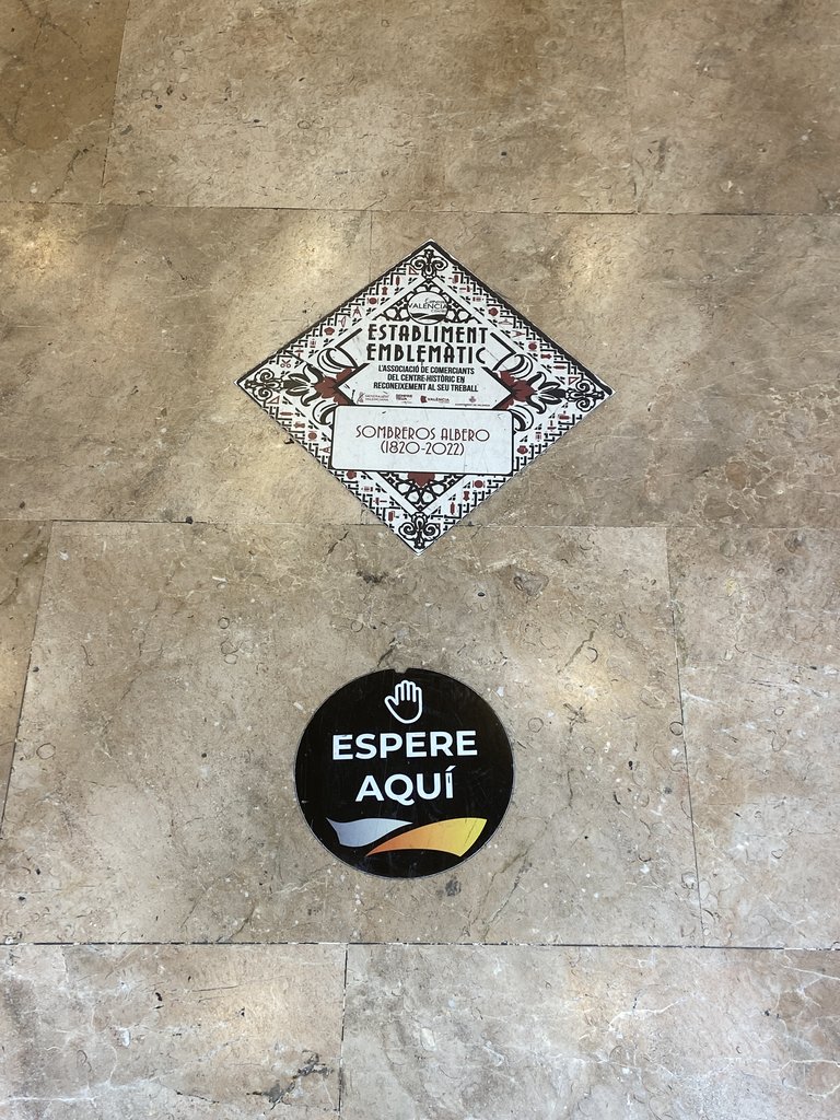 Waiting signage for customer service.