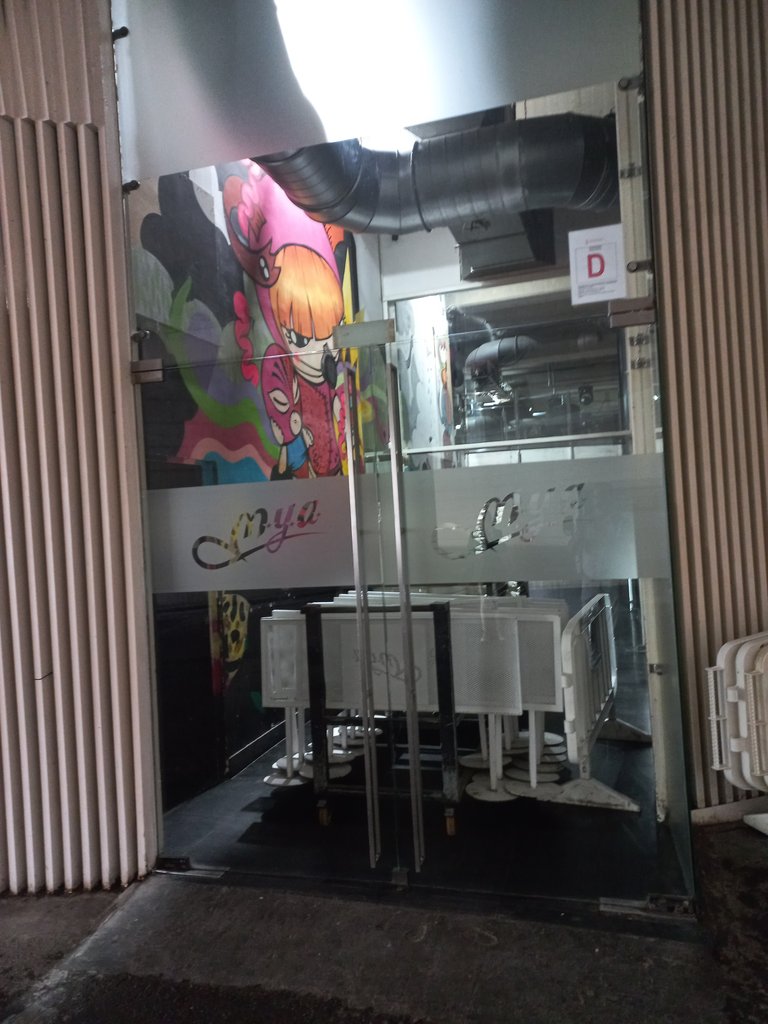 Corporate vinyl for identifying access door glass at appropriate height.