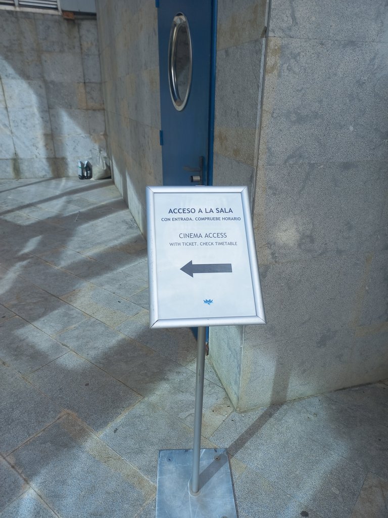 Signage with directional indicators for spatial orientation.