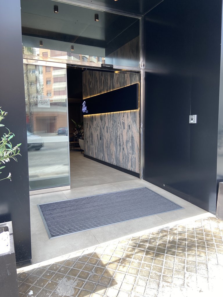 Automatic doors for establishment access.