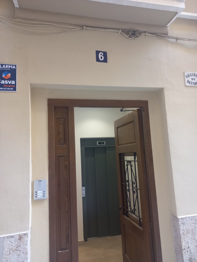 Establishment identified by door number and street name.