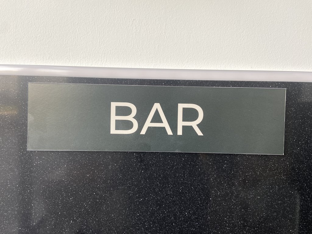 Señalización zona cafetería.