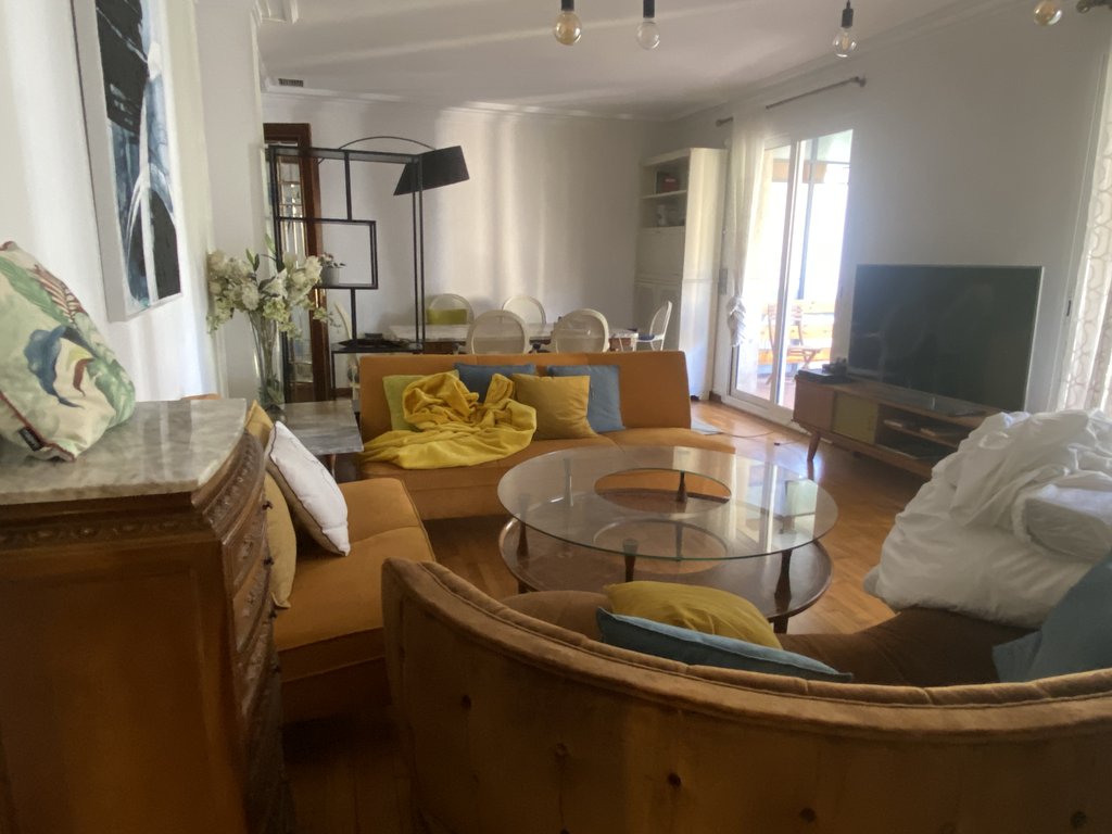 Spacious and accessible living room with proper lighting.