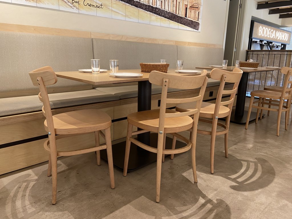 Accessible tables with appropriate height and proper lighting.