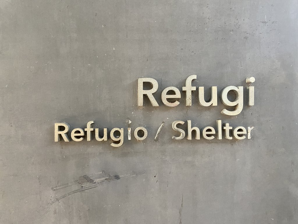 Signage for monument access in high relief.