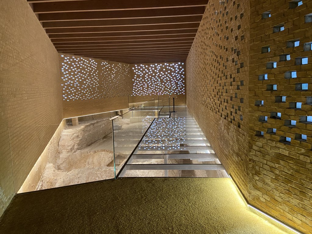 Accessible exhibition space with wide corridor and proper lighting.