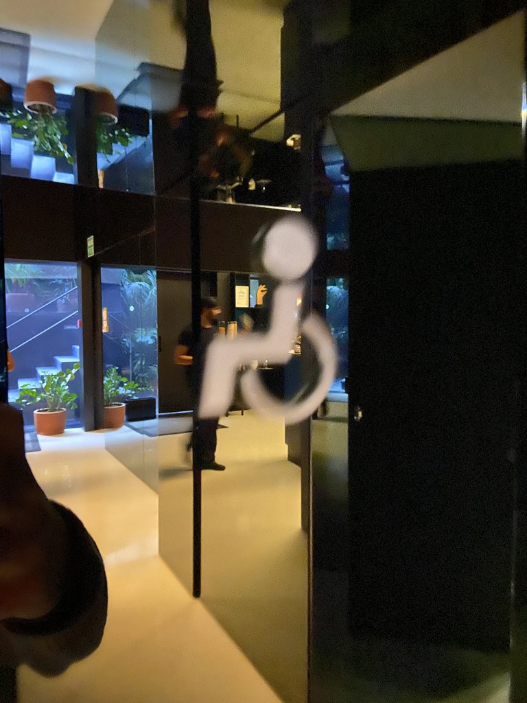 Signage for common adapted bathrooms.