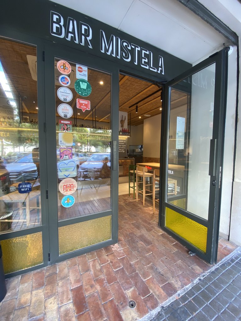 Main access to the establishment with swinging doors.