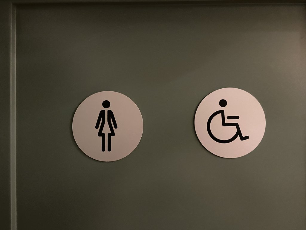 Signage for common adapted bathrooms.