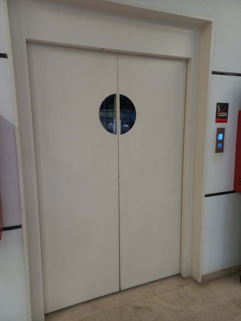 Elevator with automatic doors