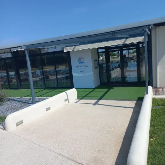Access connected with accessible route via ramp.