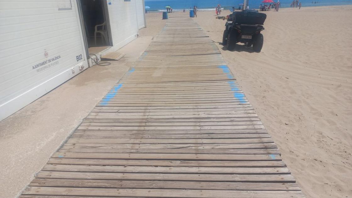 Accessible walkway approaching the bathing area.
