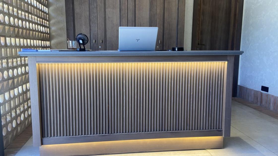 Reception counter with appropriate height.