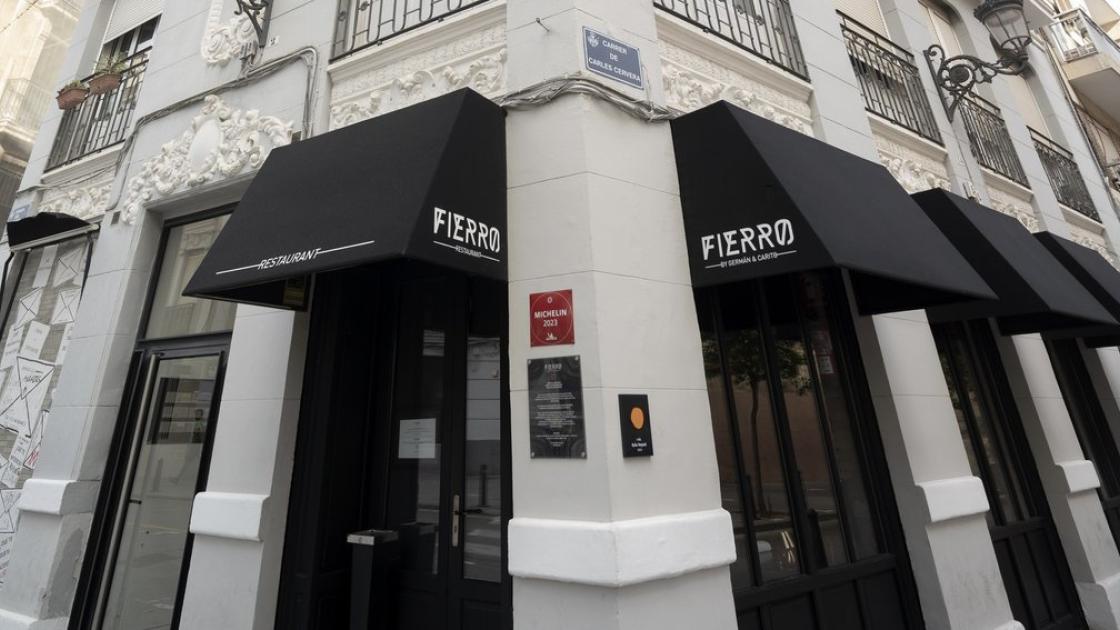 Main access to the establishment with swinging doors and proper exterior accessibility.