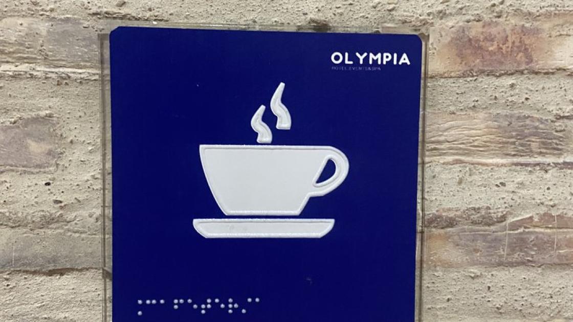 Senyalització de la cafeteria en braille.