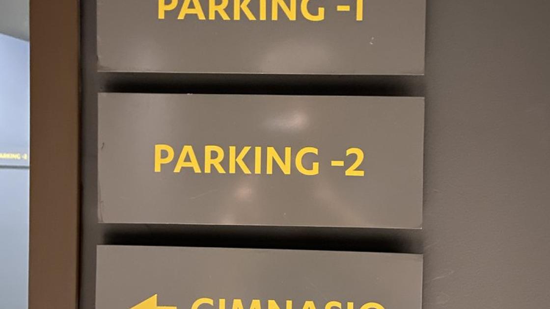 Parking and gym signage.