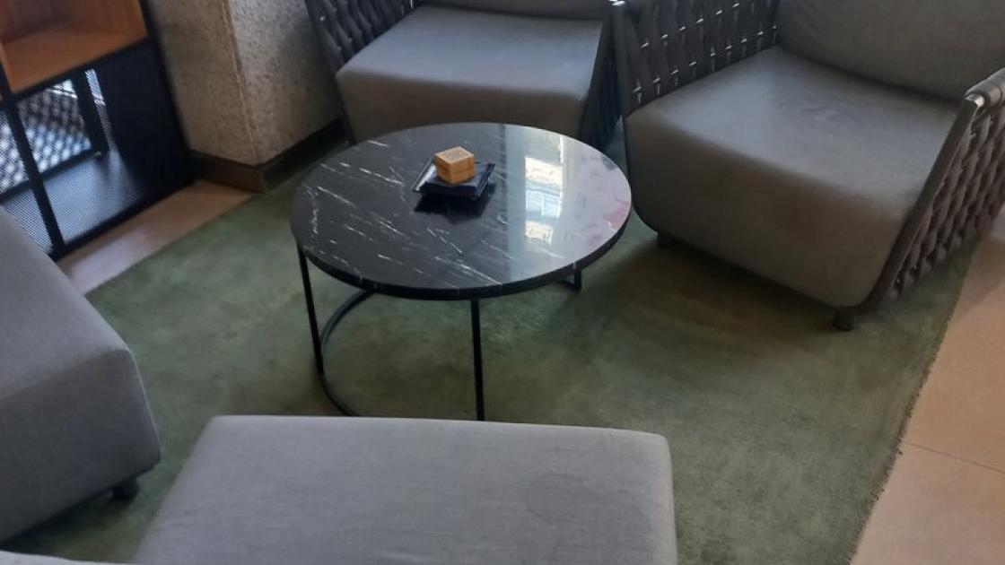 Common areas equipped with ergonomic furniture.