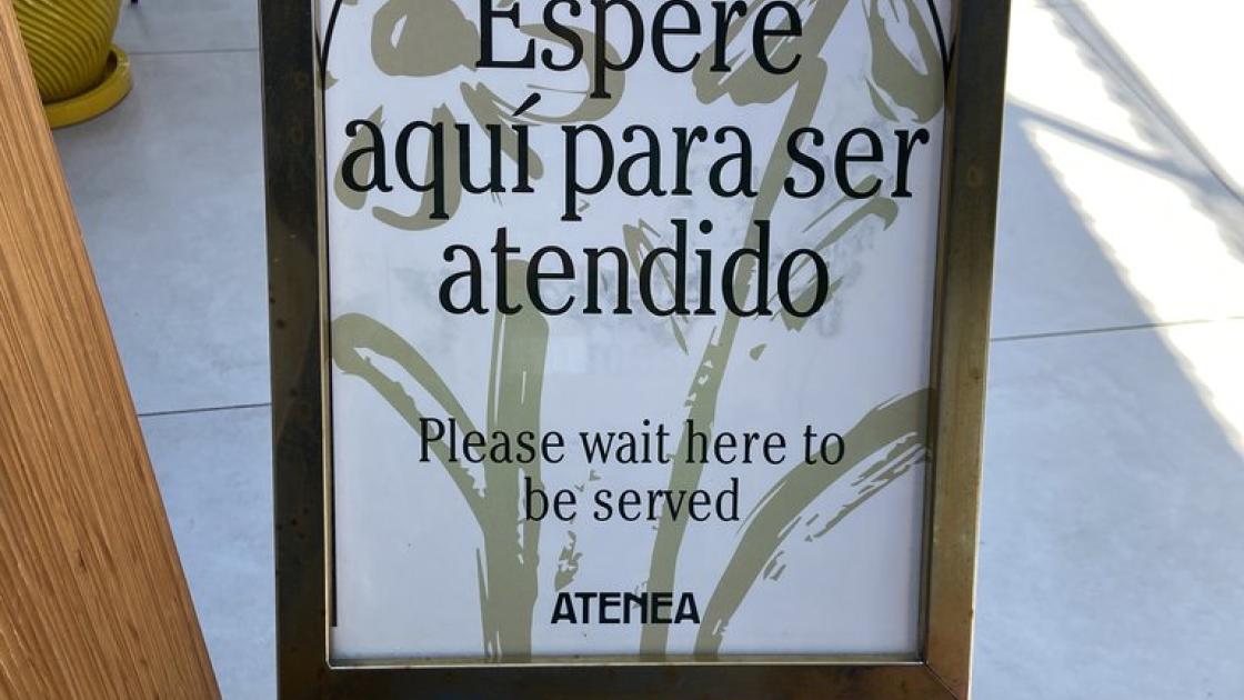 Waiting signage for customer service.