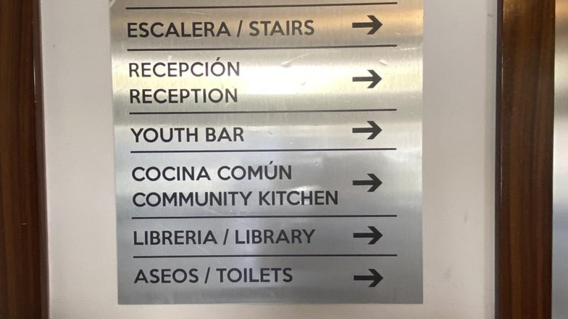 Directional signage for different spaces.
