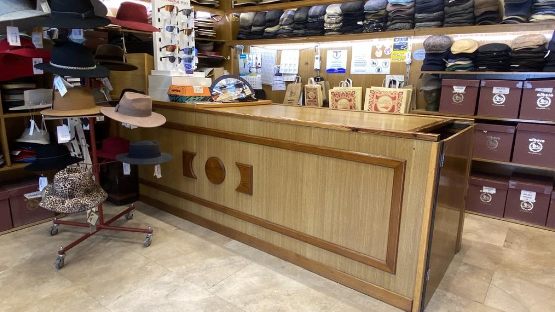 Customer service counter with appropriate height.