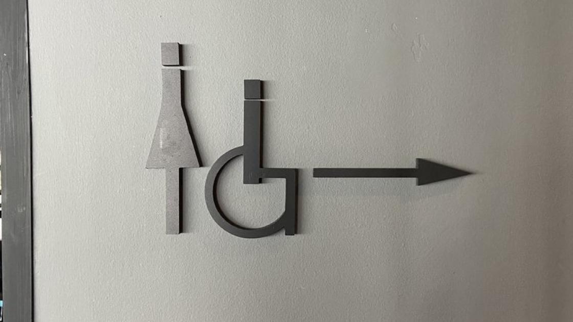 Signage for access to common bathrooms.