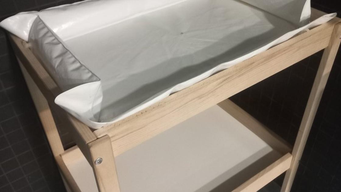Bathrooms equipped with baby changing tables.