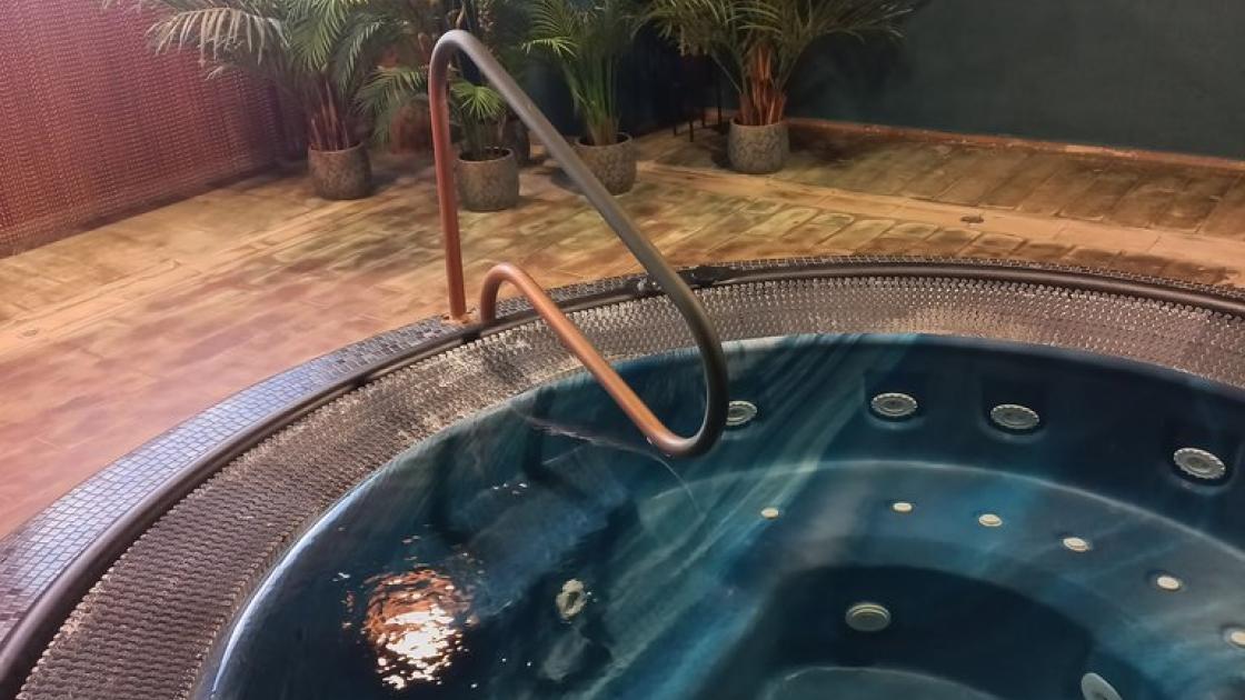 Availability of handrails in the bathing area.