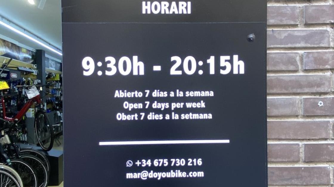 Señalización horarios de apertura.
