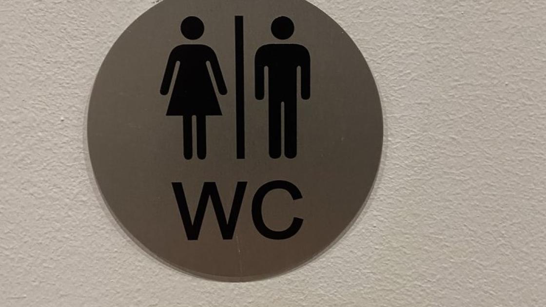 Signage for common bathrooms.