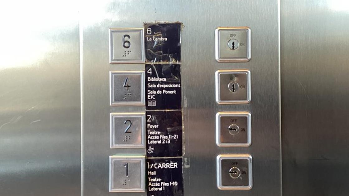 Accessible elevator with braille and illuminated buttons.