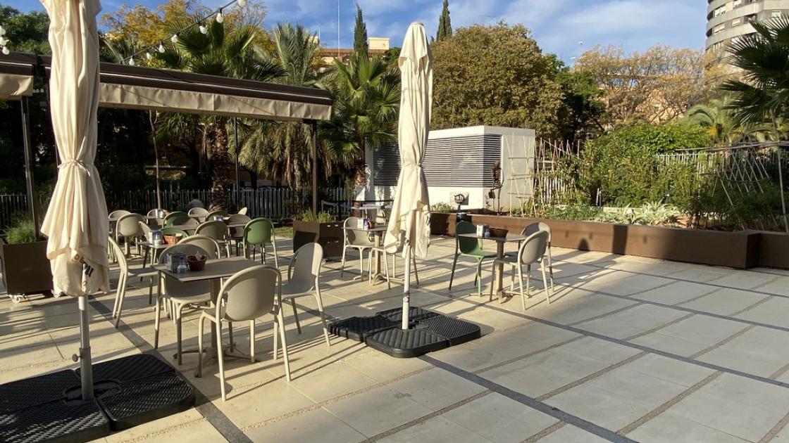 Spacious accessible outdoor terrace with accessible tables.