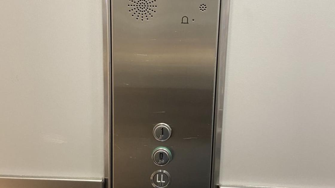 Accessible elevator with braille buttons arranged at an appropriate height.