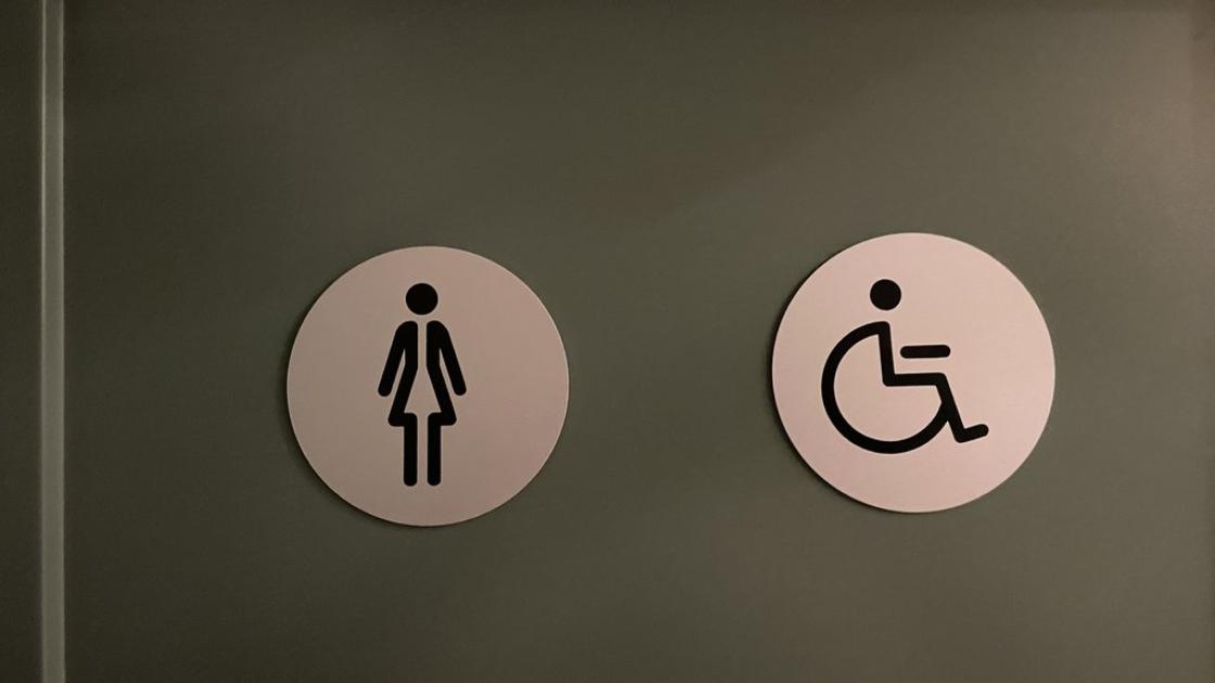 Signage for common adapted bathrooms.