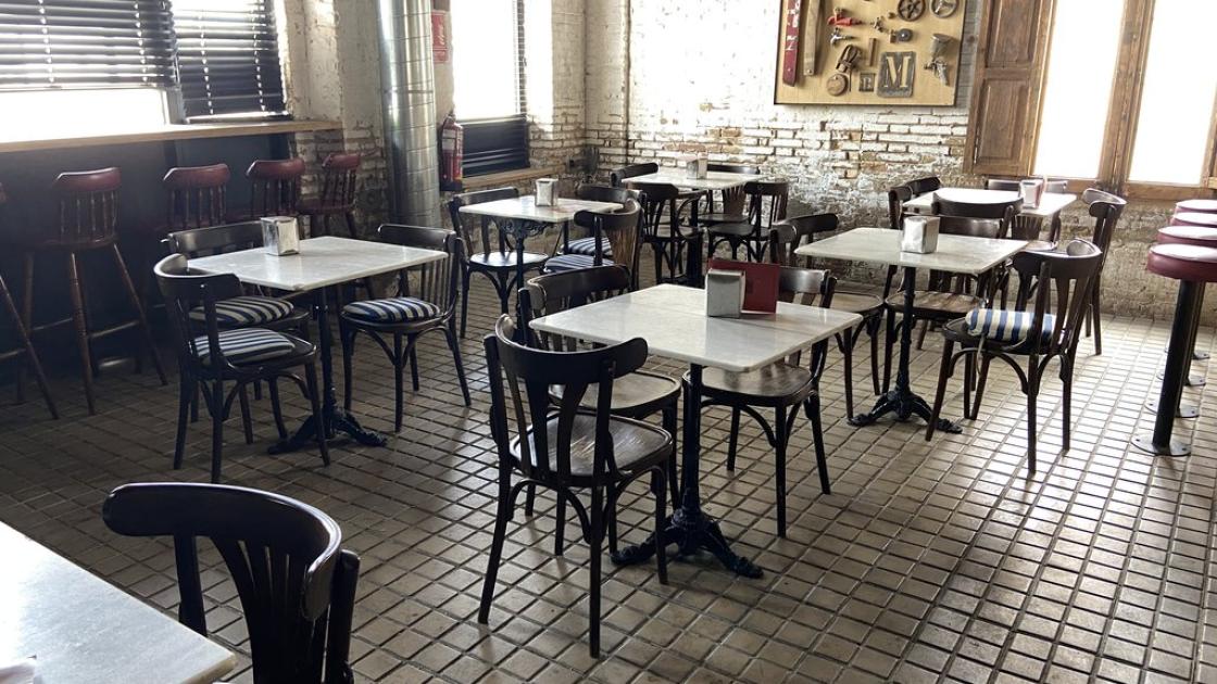 Accessible dining room, accessible tables with appropriate height and properly lit.