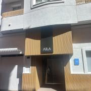 Establishment recognizable from the outside, with sign on the facade.