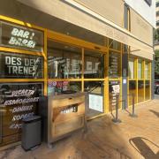 Main access to the establishment with automatic doors and proper exterior accessibility.