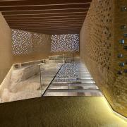 Accessible exhibition space with wide corridor and proper lighting.